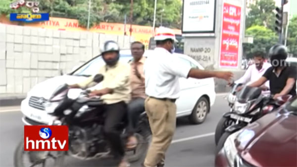 செல்போனில் பேசி கொண்ட பைக் ஓட்டியவருக்கு ரூ 31,556 அபராதம், அதிரடி வசூல் வேட்டையில் இறங்கிய போலீஸ்..!