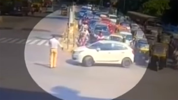 காரை ஏற்றி கொலை செய்ய முயன்ற இளைஞரை சினிமா பாணியில் விரட்டி பிடித்த போலீசார்... வைரல் வீடியோ