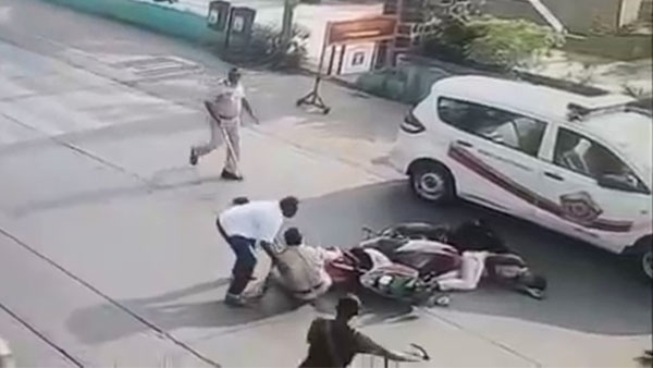 கை காட்டி நிறுத்த முயன்ற போலீஸ்காரர் மீது டூவீலரை ஏற்றிய இளைஞர்... தெரிந்தே செய்த வீடியோ வைரல்...