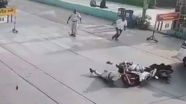 கை காட்டி நிறுத்த முயன்ற போலீஸ்காரர் மீது டூவீலரை ஏற்றிய இளைஞர்... தெரிந்தே செய்த வீடியோ வைரல்...
