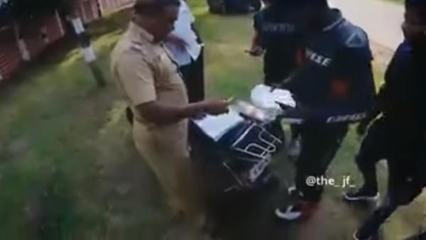 கூச்சமே இல்லாமல் காசு பிடுங்கிய தமிழக போலீஸ்காரர்... ரகசியமாக வீடியோ எடுத்து சிக்க வைத்த இளைஞர்கள்