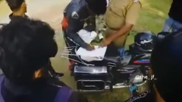 கூச்சமே இல்லாமல் காசு பிடுங்கிய தமிழக போலீஸ்காரர்... ரகசியமாக வீடியோ எடுத்து சிக்க வைத்த இளைஞர்கள்