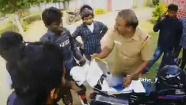 கூச்சமே இல்லாமல் காசு பிடுங்கிய தமிழக போலீஸ்காரர்... ரகசியமாக வீடியோ எடுத்து சிக்க வைத்த இளைஞர்கள்