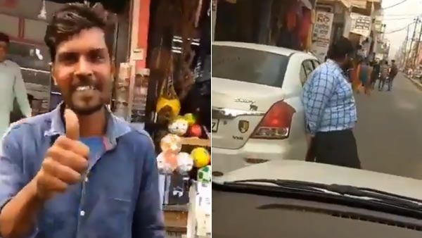 வழியை அடைத்து நின்றதால் அதிரடி... மாருதி டிசையர் காரை அசால்டாக கையில் தூக்கி ஓரமாக வைத்த டிரைவர்...