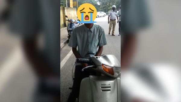 சிறுவனை பைக் ஓட்ட அனுமதித்த தந்தைக்கு ஆர்டிஓ அதிகாரி கொடுத்த 'சூப்பர் பரிசு'... !!