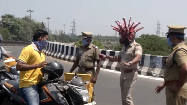 கொரோனா ஹெல்மெட்டிற்கு காரணம் இதுதான்... தமிழ்நாடு போலீஸ் எப்பவுமே வேற லெவல்... தூள் கௌப்புங்க சார்