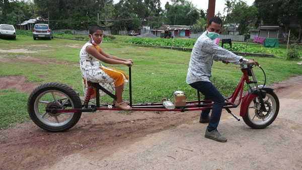 man-builds-social-distancing-electric-bi