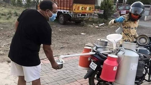 கொரோனா பரவுவதை தடுக்க சூப்பர் ஐடியா... வேற லெவலில் யோசித்த சாதாரண பால்காரர்... என்னனு தெரியுமா?