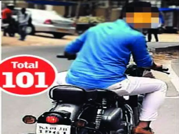 ஒரு ஆள் உயரத்திற்கு அபராத ரசீது கொடுத்த போலீஸ்... கட்ட வேண்டிய தொகையை பார்த்து ஆடிப்போன இளைஞர்...