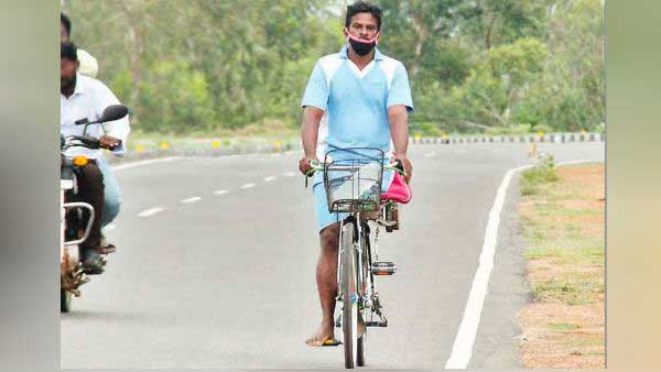தஞ்சாவூரில் இருந்து மதுரைக்கு ஒற்றை காலில் சைக்கிள் பயணம்... காரணத்தை கேட்டு கண் கலங்கும் மக்கள்...