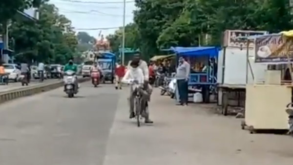 பரிட்சையில் பெயில் ஆன மகனை அமர வைத்து கொண்டு 105 கிமீ சைக்கிள் பயணம் செய்த தந்தை... ஏன் தெரியுமா?