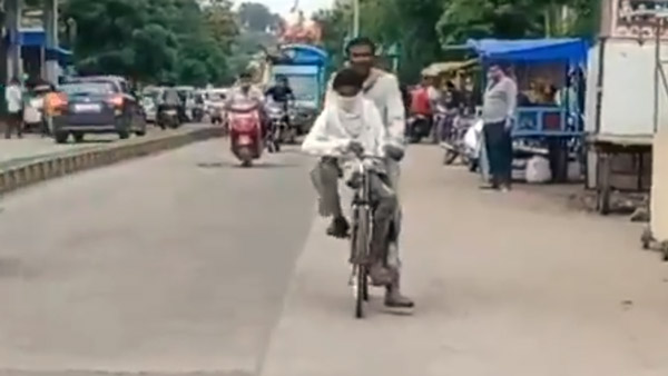 பரிட்சையில் பெயில் ஆன மகனை அமர வைத்து கொண்டு 105 கிமீ சைக்கிள் பயணம் செய்த தந்தை... ஏன் தெரியுமா?