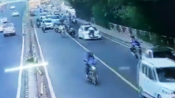 கார் டிரைவர் செய்த காரியத்தால் உறைந்து போன போலீஸ்காரர்... வீடியோ பாக்கறப்பவே அடி வயிறு கலங்குது...