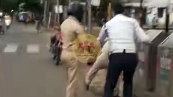 நடு ரோட்டில் குடுமிபிடி சண்டை! காவலர்களின் செயலால் மிரண்டுபோன பொதுமக்கள்... இதுக்கு காரணம் என்ன தெரியுமா?