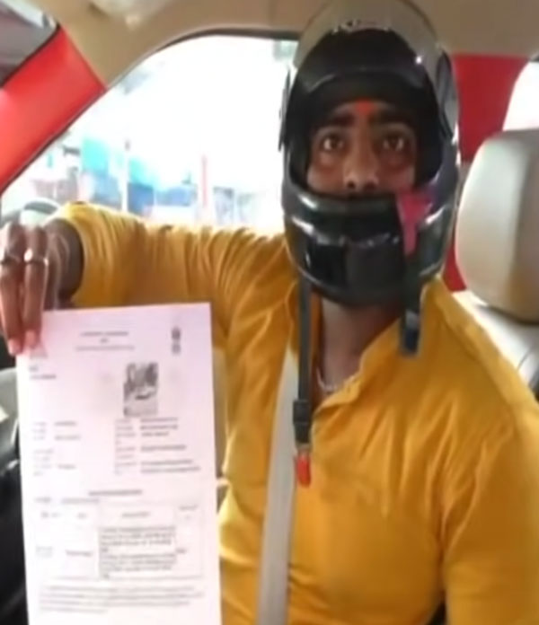 காரில் ஹெல்மெட் அணியாததற்கு அபராதமா!! உத்திர பிரதேசத்தில் நடந்துள்ள செம்ம கூத்து!